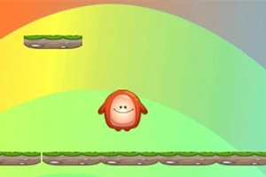 虹色の背景に緑の草が生えたプラットフォームの上で赤いキャラクターが跳んでいる。