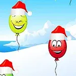 雪景色の中でサンタ帽をかぶった笑顔の風船が空に浮かんでいる絵。