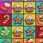 カラフルな背景に、さまざまな形のクリスマス風クッキーが並んでいる画像。