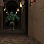 石の廊下の奥に緑色のモンスターが立っている。