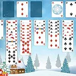 冬の背景にトランプのカードが並び、左下にクリスマスツリーと小さな家が描かれているイメージ。