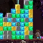 色とりどりのブロックが積み重なった壁と、右側に座っている鍛冶屋のキャラクター。