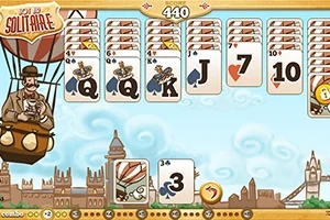 熱気球に乗った男性と、空を背景にしたカードゲームの画面。