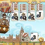 熱気球に乗った男性と、空を背景にしたカードゲームの画面。