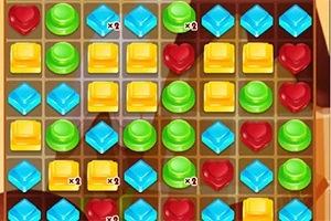 カラフルなジェムが並んだパズルゲームのグリッド。