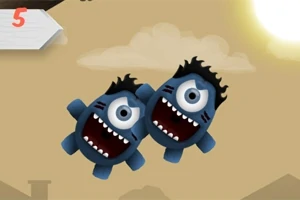 空を飛んでいる2匹の笑顔の青いモンスターキャラクター。