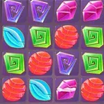 カラフルな宝石やキャンディーが整然と並んだグリッドの画像。