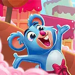 青いクマのキャラクターがカラフルなキャンディーランドの背景で両手を広げている。