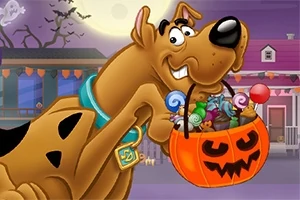 大きな犬がハロウィンのカボチャバスケットをくわえており、中にはキャンディがたくさん入っている。