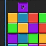 カラフルなブロックが縦に積み重なったデジタルパズルイメージ。