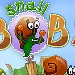 緑色のカタツムリのキャラクターが笑顔で描かれたイラストと大きな文字のロゴ。