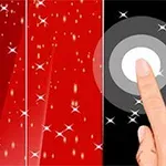 赤い背景に星が散りばめられた黒いタイルを指でタップしている画像。